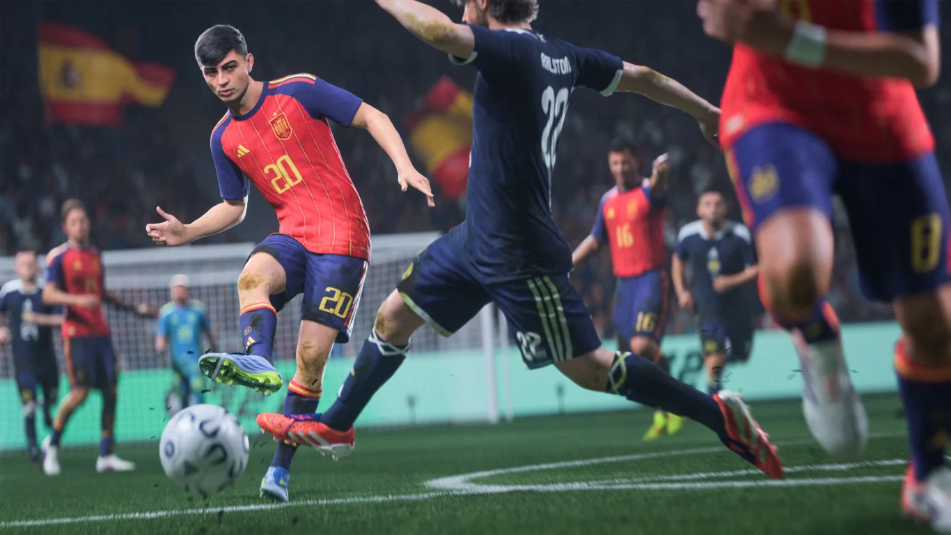 EA Sports FC 27 EA Sports FC 27. Piłkarz w czerwono-niebieskiej koszulce z numerem 20 podaje piłkę podczas meczu, obrońca blokuje ruch.