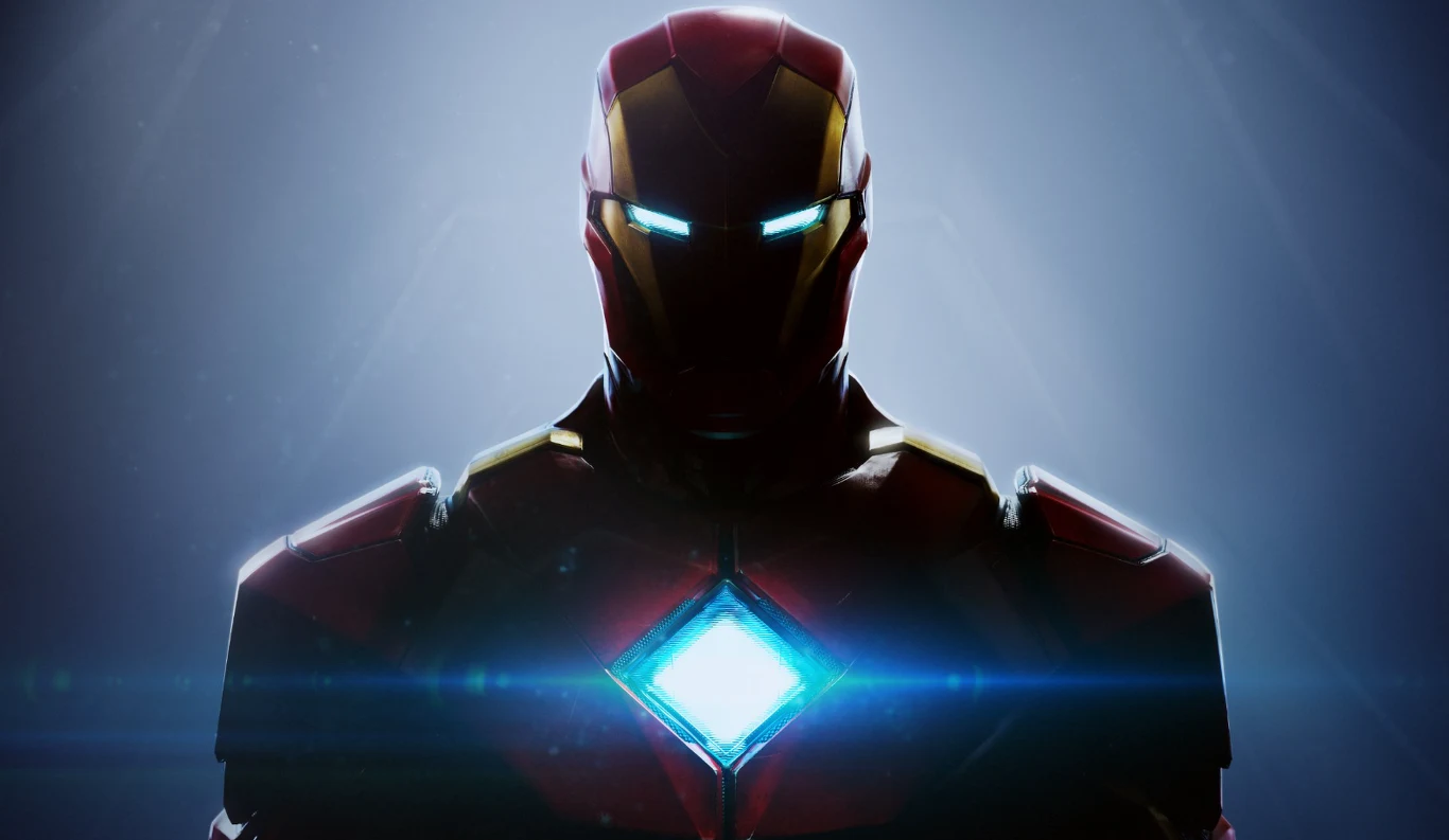 Iron Man od Electronic Arts Iron Man w czerwono-złotym pancerzu z jasnym reaktorem na piersi i świecącymi oczami LED na ciemnym tle.