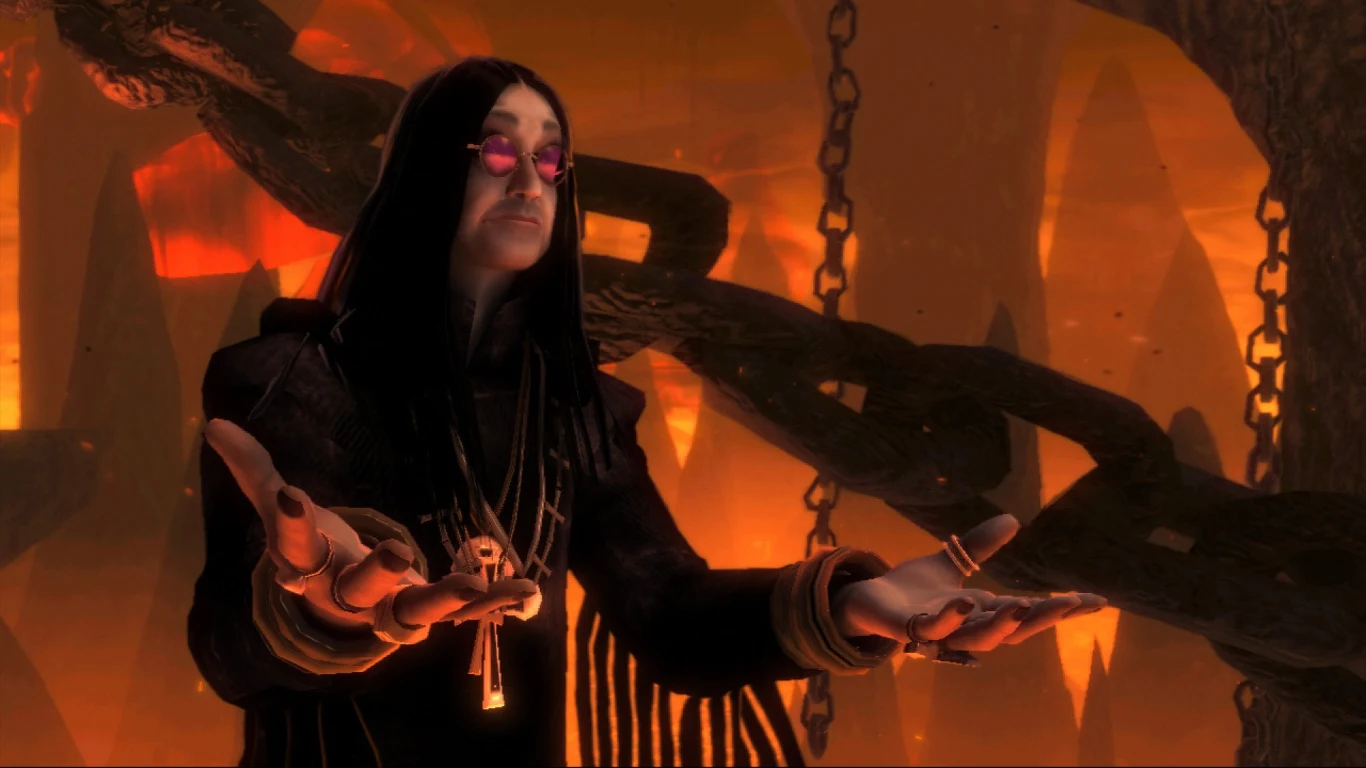 Brutal Legend Postać z gry Brütal Legend w ciemnych okularach i czarnych szatach, na tle metalowych łańcuchów i jaskini.