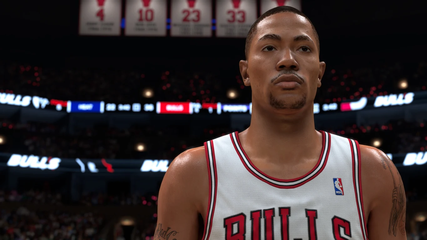 NBA 2K27 Koszykarz w stroju Chicago Bulls stoi na tle trybun i tablic z zastrzeżonymi numerami, w oświetlonej hali sportowej.