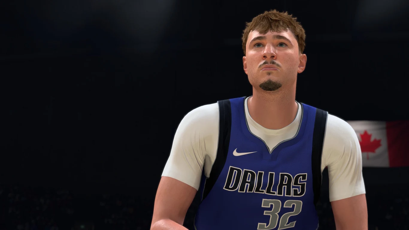 NBA 2K27 Zawodnik drużyny Dallas Mavericks w niebieskim stroju z numerem 32 skupiony podczas wykonywania rzutu.