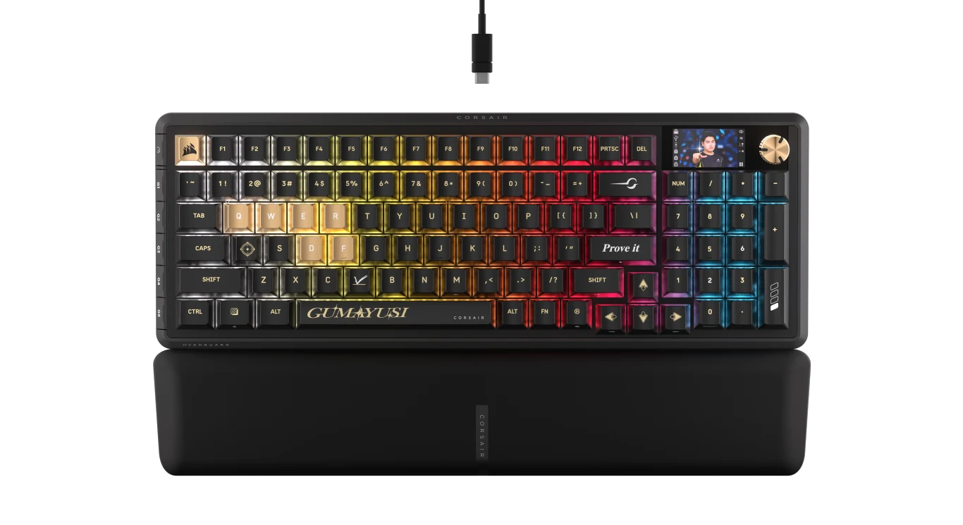 VANGUARD PRO 96 - edycja GUMAYUSI Nowoczesna klawiatura mechaniczna z wielokolorowym podświetleniem RGB, personalizowanymi nasadkami klawiszy, wyświetlaczem LCD w prawym górnym rogu oraz złotym pokrętłem regulacyjnym, wyposażona w podpórkę pod nadgarstki.