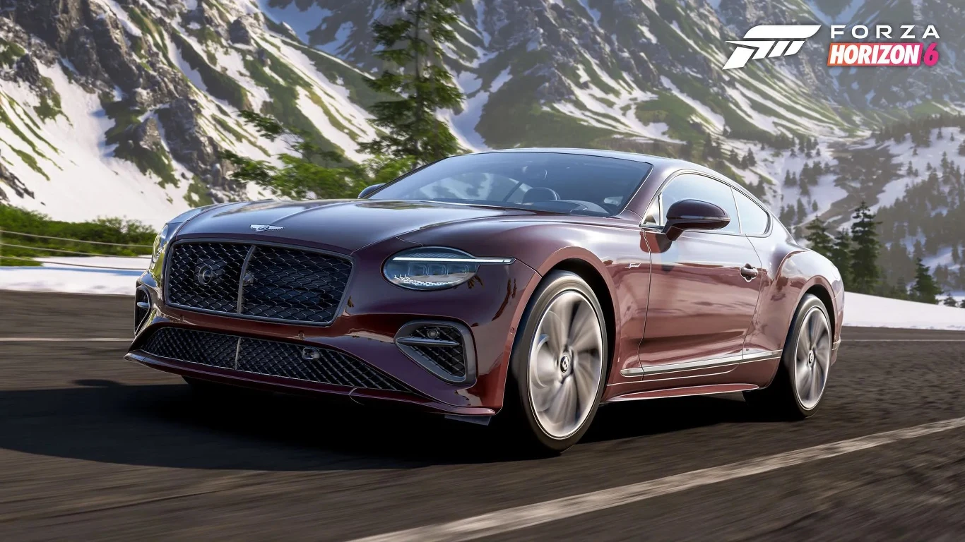 Forza Horizon 6 Luksusowe bordowe coupe na asfaltowej drodze w górach, logo Forza Horizon 6 w rogu.