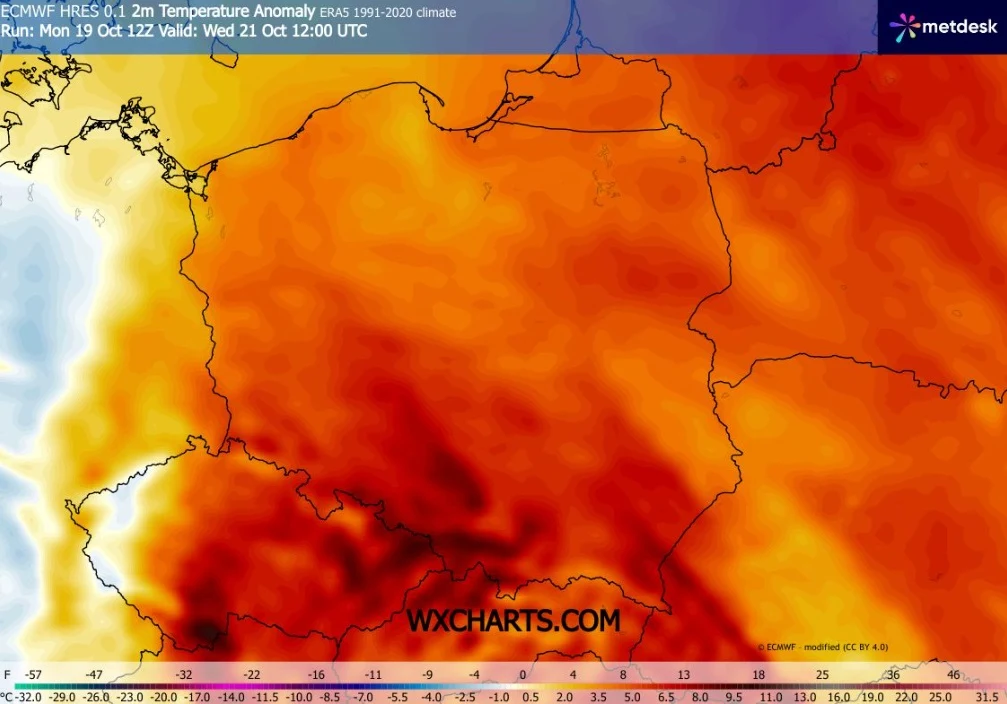 Mapa Polski z zaznaczonymi anomaliami temperatury powietrza, prezentująca silne ocieplenie zwłaszcza na południu kraju, gdzie odcienie czerwieni i pomarańczu wskazują na znacznie wyższe niż normalnie wartości temperatury.