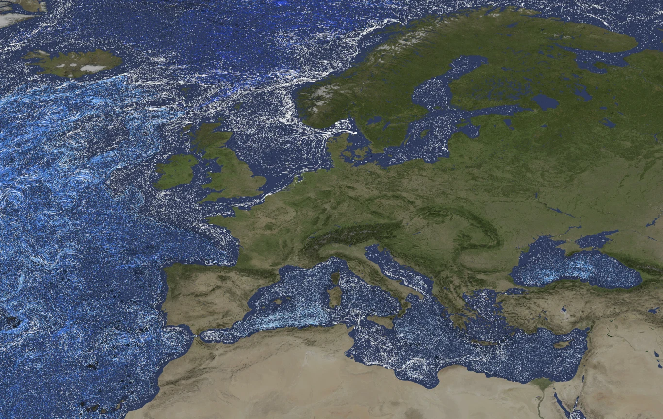 Zmiany pływów oceanicznych mają kolosalne znaczenie dla klimatu Ziemi Ziemia z lotu ptaka, widoczne kontynent europejski oraz północna Afryka, a wokół nich niebieskie morze z zaznaczonymi białymi liniami prądów morskich.