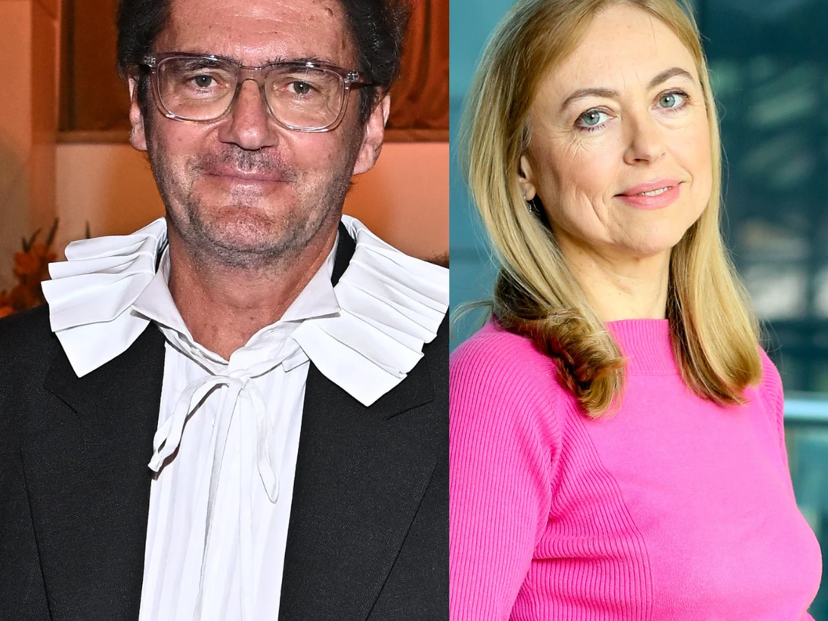 Kuba Wojewódzki, Monika Rosca Kuba Wojewódzki i Monika Rosca. Mężczyzna w białej koszuli i okularach stoi obok kobiety w różowym swetrze.