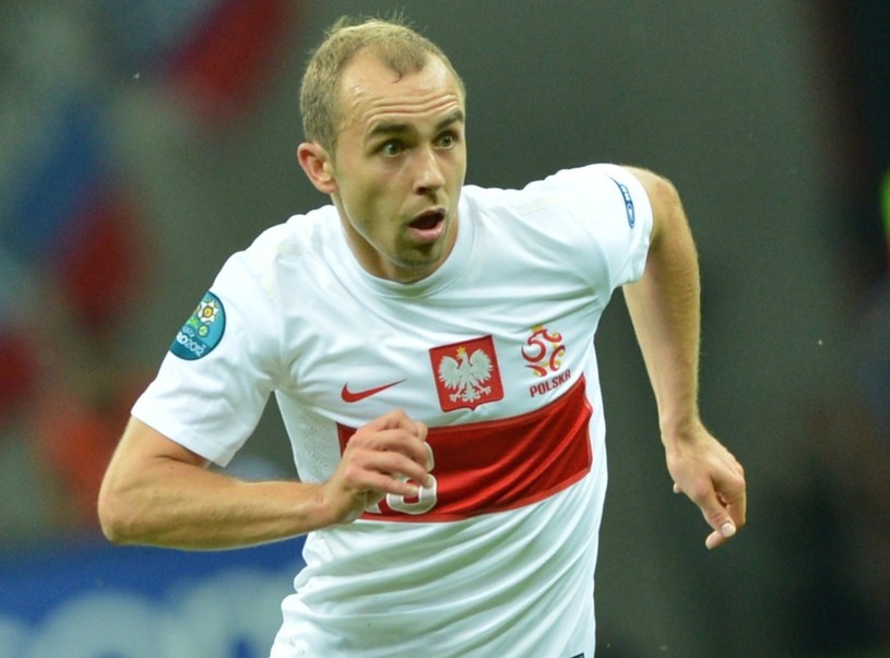 Adrian Mierzejewski w koszulce reprezentacji Polski /AFP