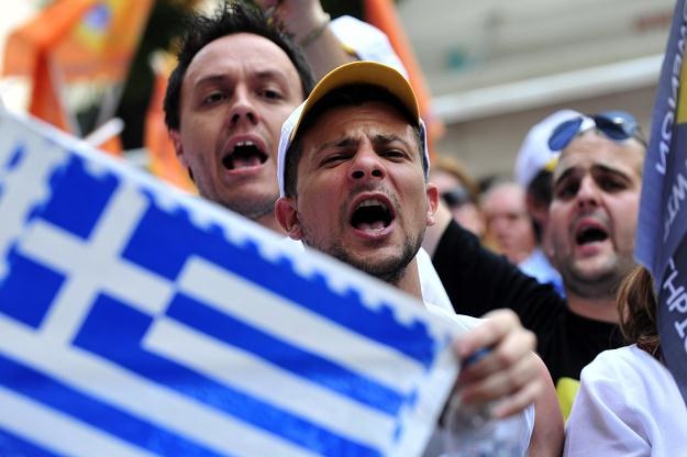 Agencja S&P poinformowała, że najnowszy plan ratunkowy dla Grecji nie wyprowadzi jej z długów /AFP