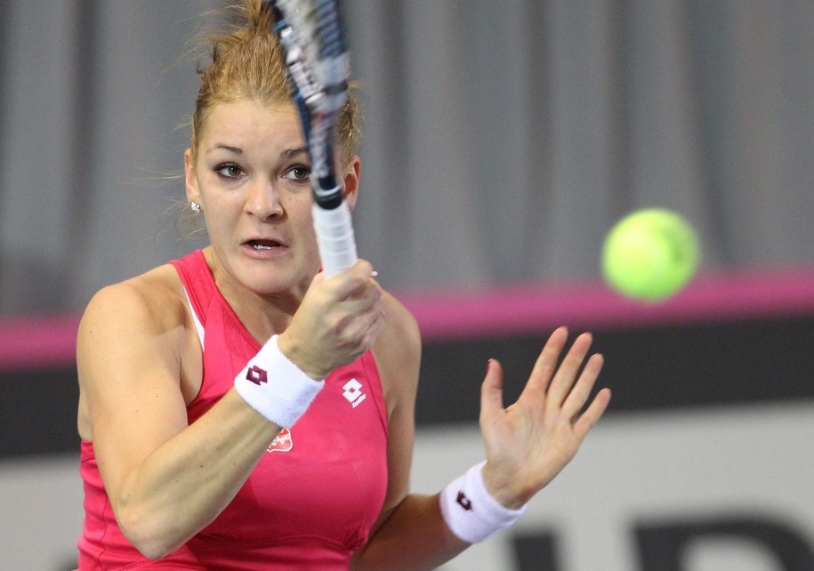 Agnieszka Radwańska wyjdzie dziś na kort jako pierwsza z trójki Polaków /JULIEN WARNAND /PAP/EPA