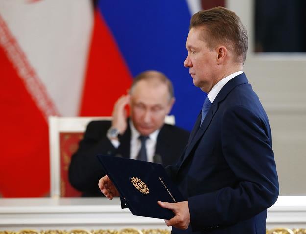 Aleksiej Miller, Gazprom i Władimir Putin (w tle) wczoraj na Kremlu /AFP