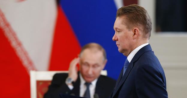 Aleksiej Miller, Gazprom i Władimir Putin (w tle) wczoraj na Kremlu /AFP