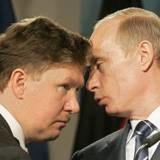 Aleksiej Miller (L) to zaufany człowiek prezydenta Putina /AFP