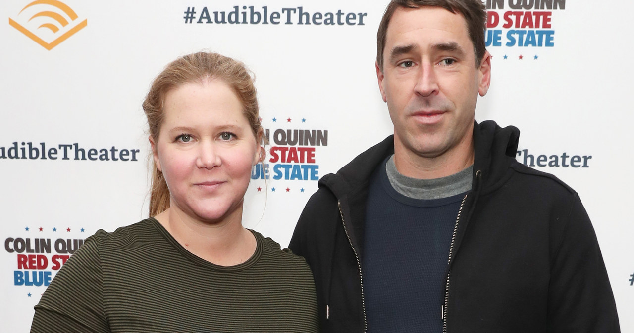 Amy Schumer z mężem na premierze /Cindy Ord /Getty Images