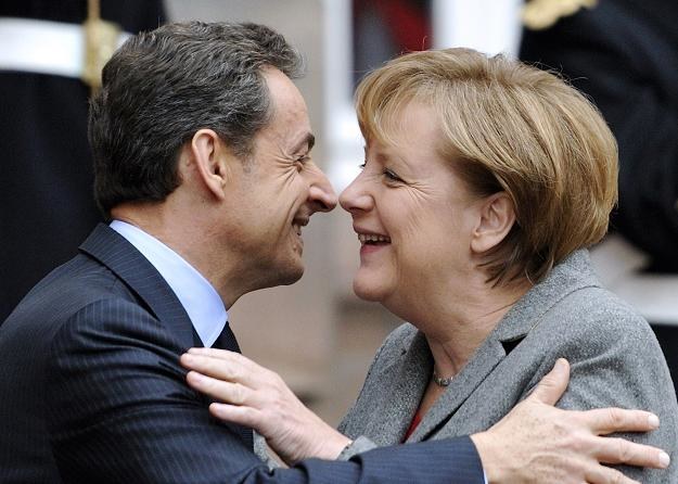 Angela Merkel i Nicolas Sarkozy zapowiadają, że ze strefy euro stworzą unię fiskalną /AFP
