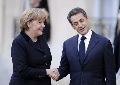 Angela Merkel i Nicolas Sarkozy znaleźli wspólną drogę do wyjścia z kryzysu? /AFP