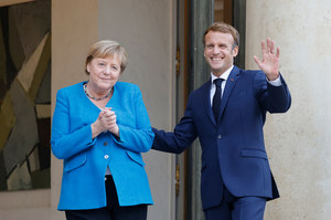 Angela Merkel.  The EU crisis manager leaves.  Macron can rub his hands