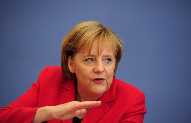 Angela Merkel: - Uważamy, że ograniczanie deficytów budżetowych jest niezbędne do trwałego wzrostu /AFP