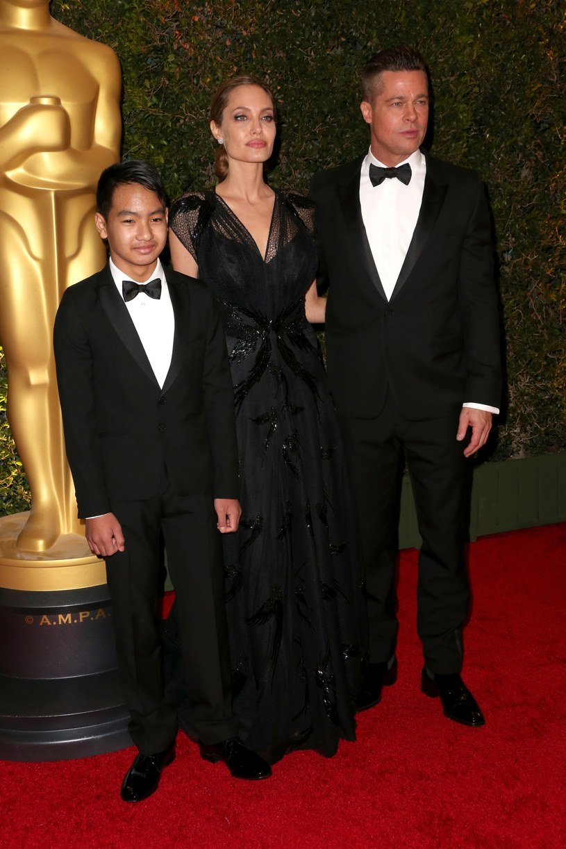 Angelina i Brad z synem Maddoxem /Frederick M. Brown /Getty Images