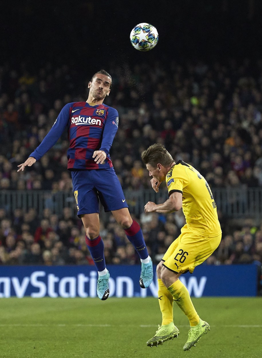 Antoine Griezmann i Łukasz Piszczek /	Alejandro Garcia /PAP/EPA