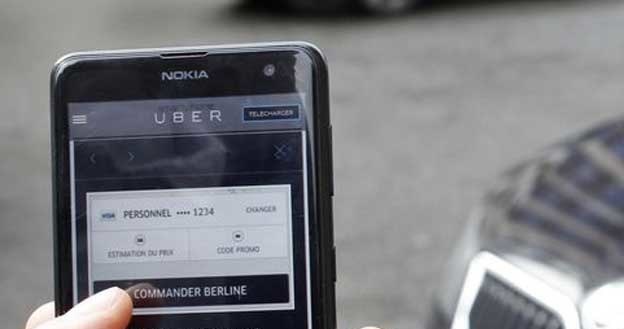 Aplikacja Uber ma wielu przeciwników /AFP