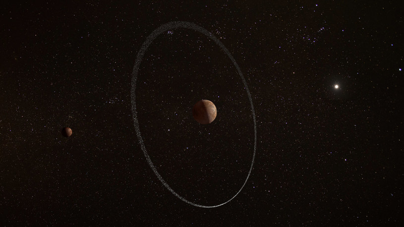Artystyczna wizja pierścienia Quaoaru. Jest to planeta karłowata, znajdująca się na obrzeżach Układu Słonecznego. Jego orbita jet 44 razy większa niż Ziemi. Jest to siódmy obiekt w naszym systemie, u którego wykryto pierścień po Saturnie, Jowiszu, Uranie, Neptunie i planetoidach Chariklo i Haume
