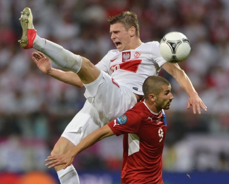 Bez Łukasza Piszczka (tu w meczu z Czechami podczas Euro 2012) Polakom będzie grało się ciężej. /AFP