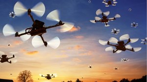 Bezprzewodowe ładowanie roju dronów podczas lotu