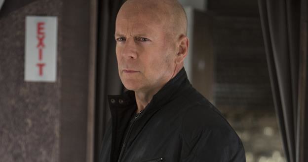 Bruce Willis - jako Frank Moses - w scenie z filmu "Red 2" /materiały dystrybutora