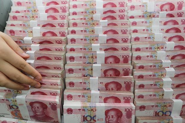 Chiński juan czwartą walutą świata /AFP