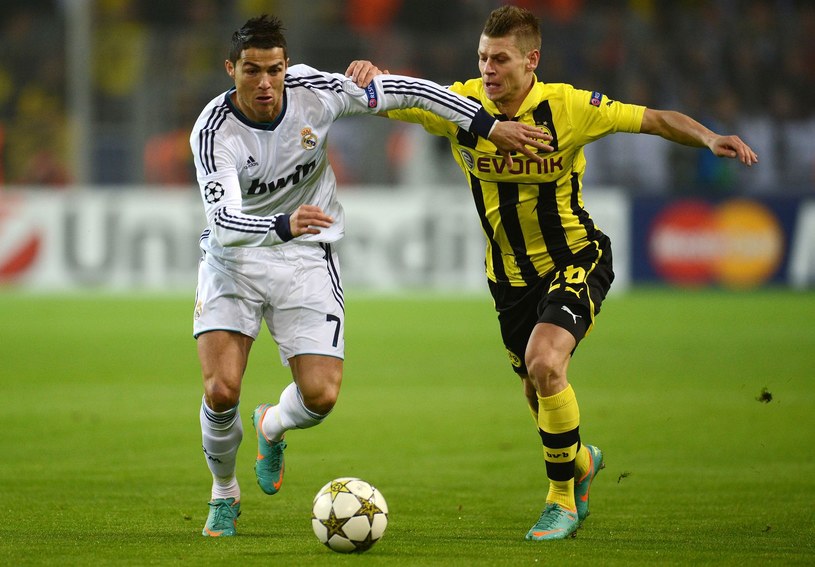 Cristiano Ronaldo i Łukasz Piszczek - pościg w Mercurialach /Getty Images/Flash Press Media
