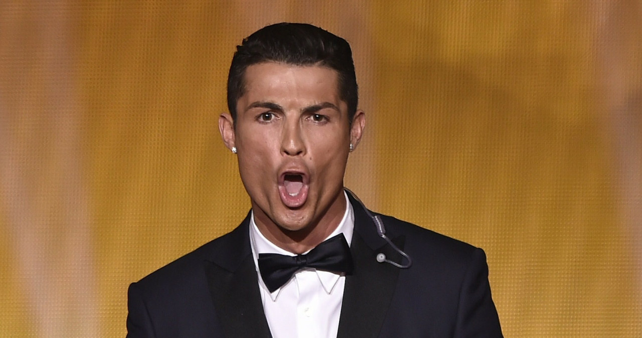 Cristiano Ronaldo po otrzymaniu nagrody FIFA Ballon d'Or w 2014 roku. /FABRICE COFFRINI / AFP /East News