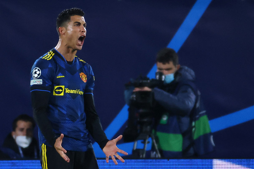 Cristiano Ronaldo zdaniem brytyjskiej prasy ma być chętny na zerwanie kontraktu z Manchesterem United. Czy poleci z drużyną na tournee? /JOSE JORDAN / AFP /AFP