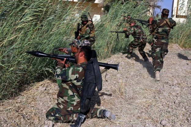 Członkowie irackich szyickich Brygad Pokoju walczący z Państwem Islamskim /ALAA AL-SHEMAREE /PAP/EPA