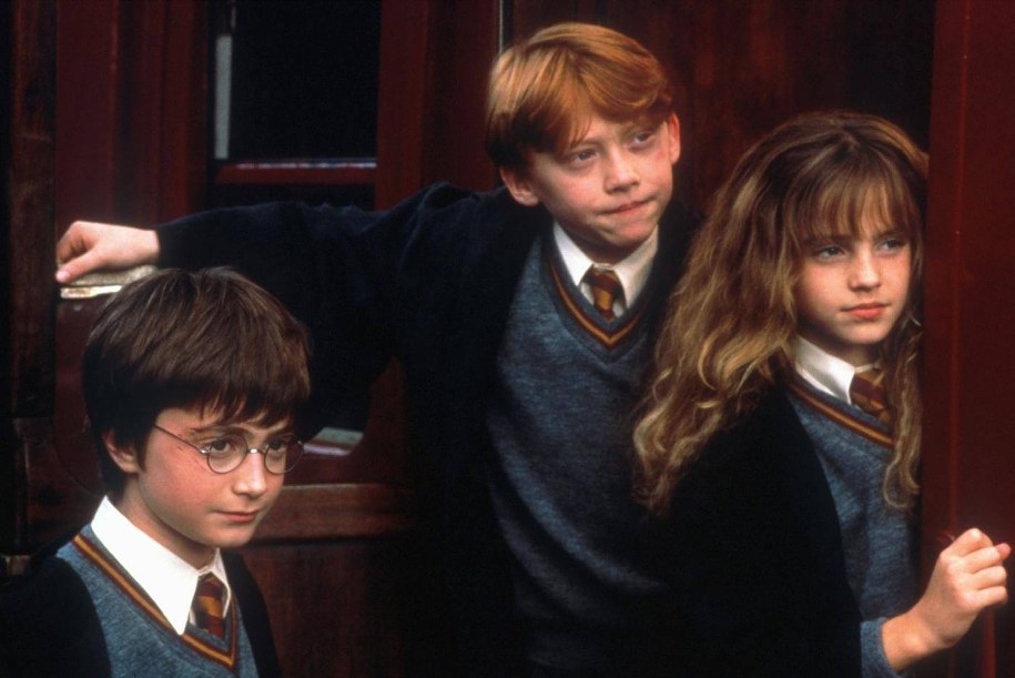 Daniel Radcliffe, Rupert Grin i Emma Watson na planie filmu "Harry Potter i kamień filozoficzny" /United Archives/IFTN /DPA /PAP/DPA