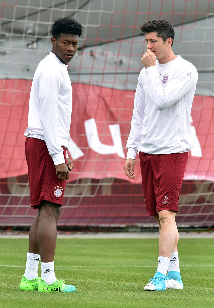 David Alaba i Robert Lewandowski na treningu przed meczem z Realem. /AFP