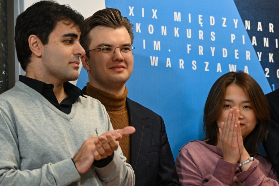 David Khrikuli - Gruzja (L) i Polak Piotr Alexewicz (2L) podczas ogłoszenia wyników / 	Radek Pietruszka   /PAP