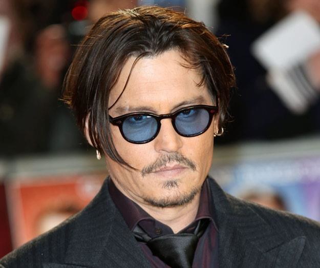 Do kogo pije Johnny Depp? (fot. Tim P. Whitby) /Getty Images