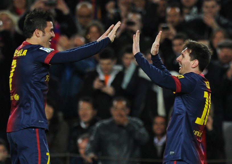 Duet Lionel Messi (z prawej) - David Villa funkcjonował rewelacyjnie i poprowadził Barcelonę do zwycięstwa z Rayo Vallecano /AFP
