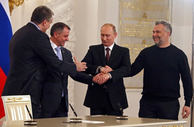 Dwa dni po referendum Putin podpisał traktat oficjalnie włączający Krym do Rosji /SERGEI ILNITSKY / POOL /PAP/EPA