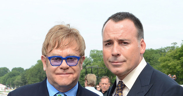 Elton John, David Furnish /Michael Kovac /Getty Images