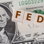 Fed: Polityka pieniężna USA może być bardziej restrykcyjna 
