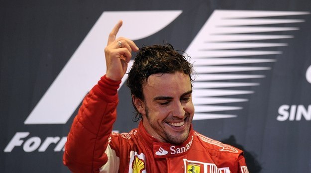 Fernando Alonso, odkąd reprezentuje barwy Ferrari, nie miał jeszcze szansy wygrać w Japonii /INTERIA.PL/PAP