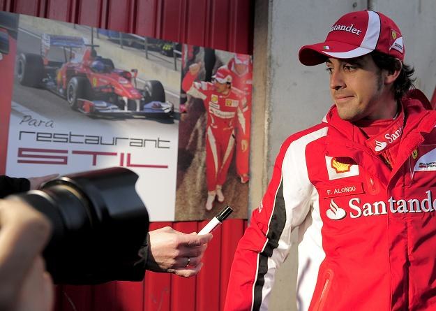 Fernando Alonso uważa, że Robert Kubica wróci na tor i zostanie mistrzem świata /AFP