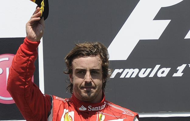 Fernando Alonso woli jazdę dla Ferrari niż tytuł mistrza świata /AFP