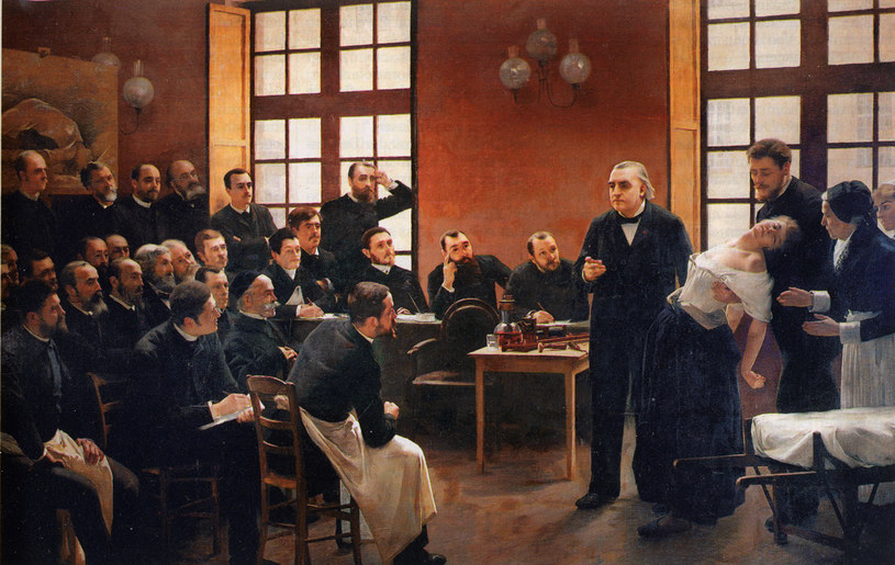 Francuski neurolog Jean-Martin Charcot podczas wykładu prezentuje pacjentkę z napadem histerii. Obraz: Une leçon clinique à la Salpêtrière, 1887 r. /André Brouillet /domena publiczna