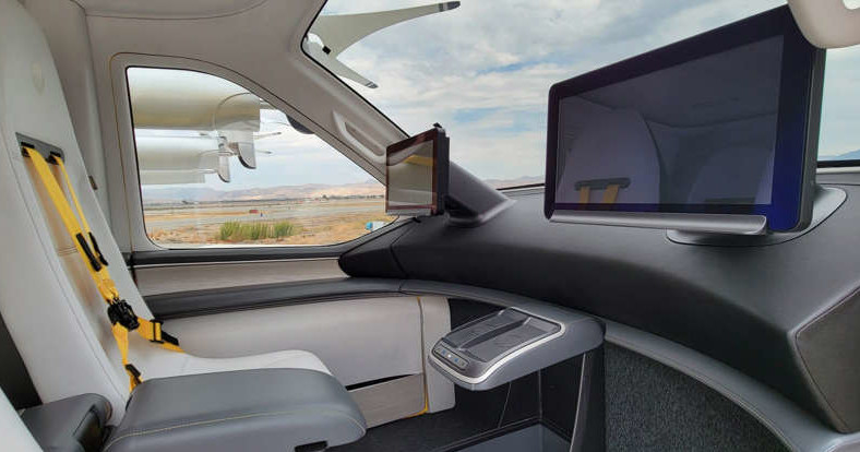 Futurystyczny wygląd i ogromne ekrany - projektanci wnętrza Wisk Gen 6 zadbali o najdrobniejsze szczegóły kabiny pasażerskiej. /foto: Wisk Aero /domena publiczna