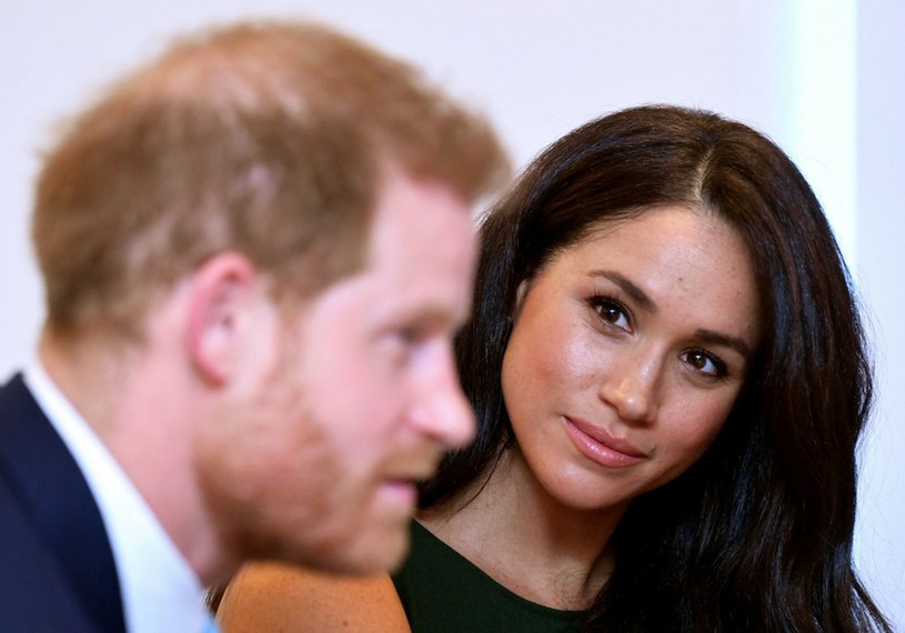Gdy książę Harry związał się z Meghan Markle znacznie zmienił styl życia. /TOBY MELVILLE/AFP /East News