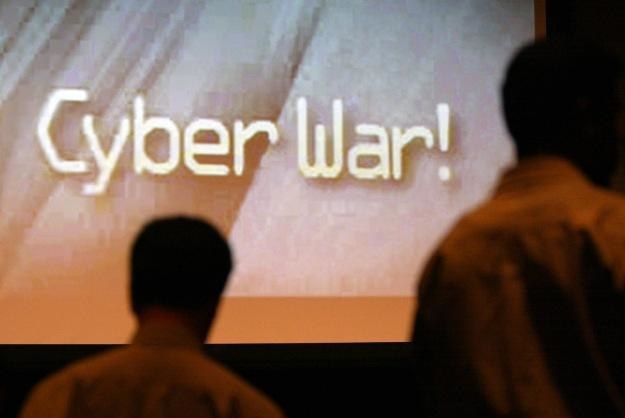 Hakerzy z Anonymous i LulzSec zapowiadają wspólną ofensywę w cyberprzestrzeni /AFP