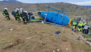 Spain.  The 60-year-old crashed the helicopter he was using to monitor the speed of cars.  He was intoxicated