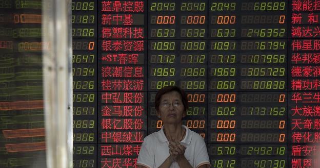 Inwestorzy spodziewają się - dewaluacja juana /AFP
